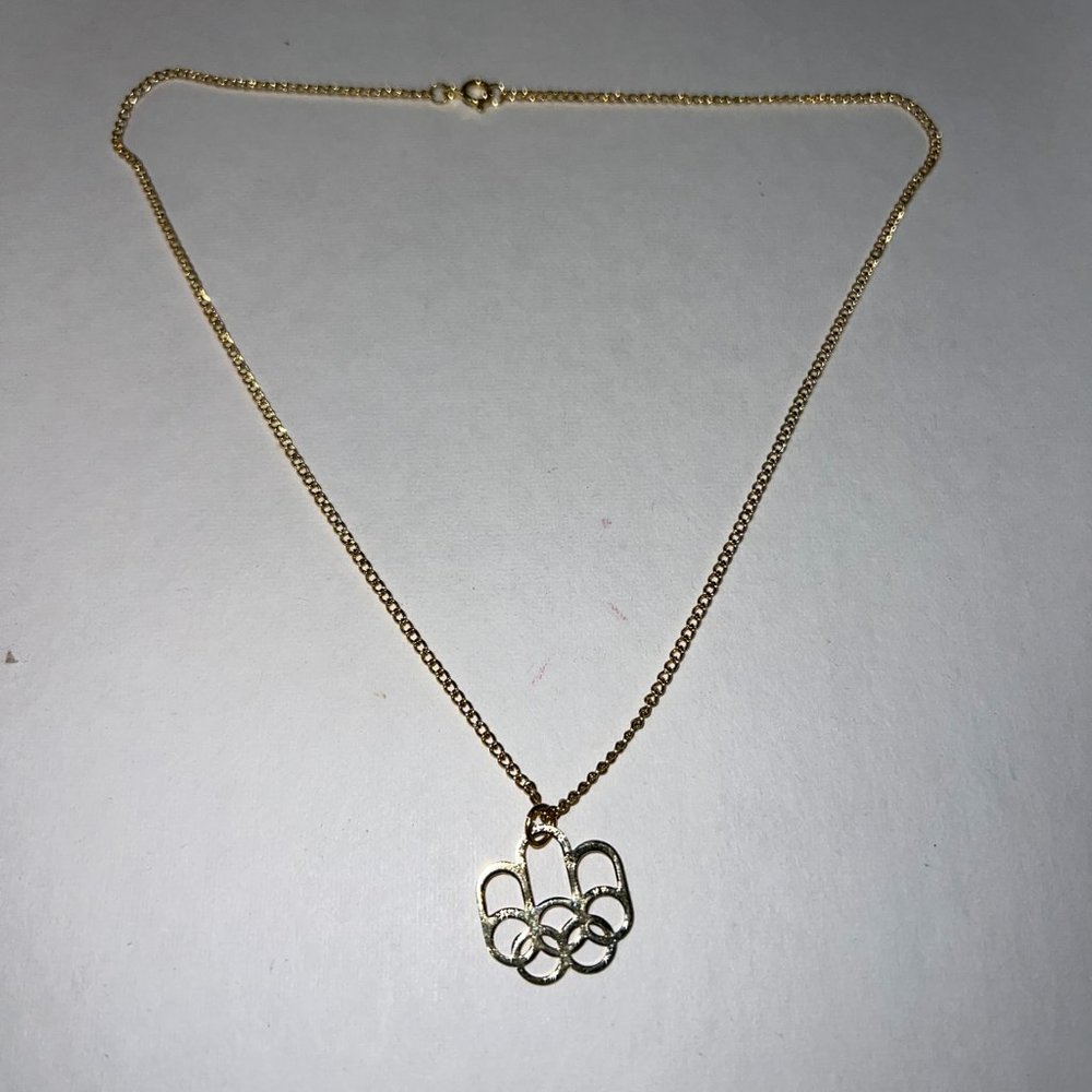 1976 MONTREAL OLYMPIC GAMES NECKLACE And Pin Duo Brotherhood.  Chain is 16”.